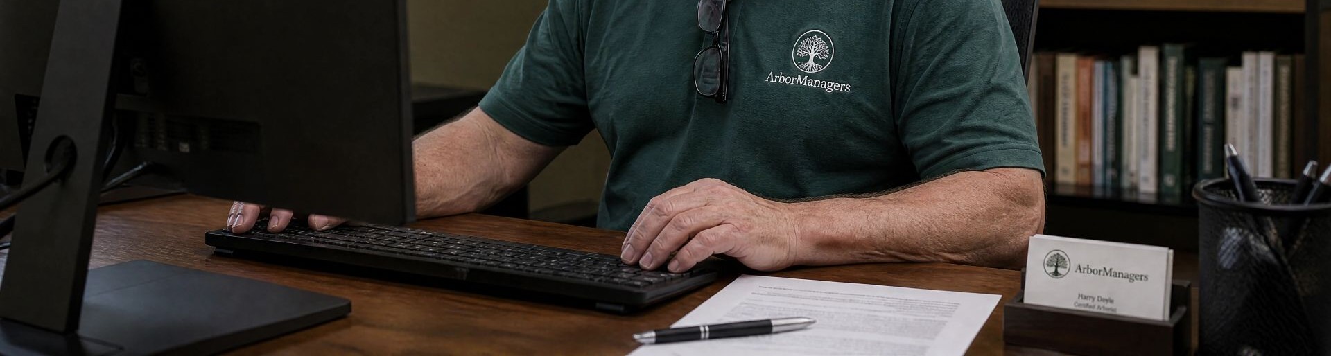 ISA Certified Arborist writing a tree assessment report and documentation
